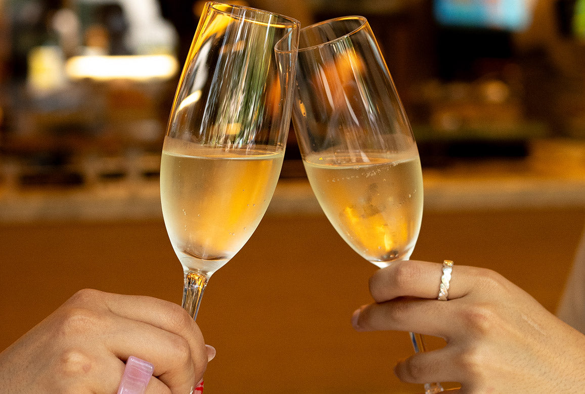Champagne glasses cheering
