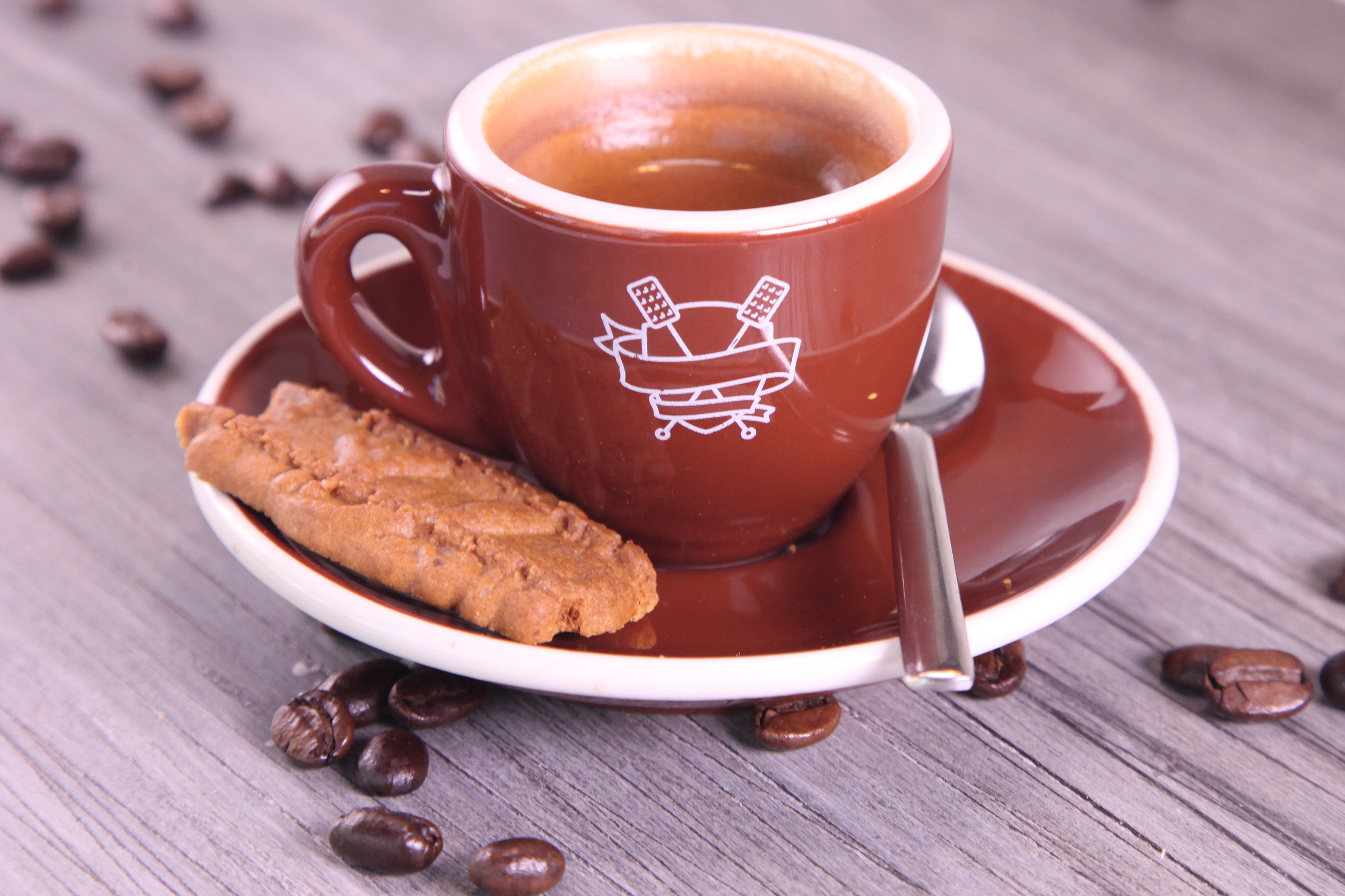 A cup of espresso with a spekuloos cookie